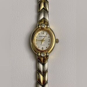 Sergio Valente Gold and Silver Watch with Oval Face and Chevron Band